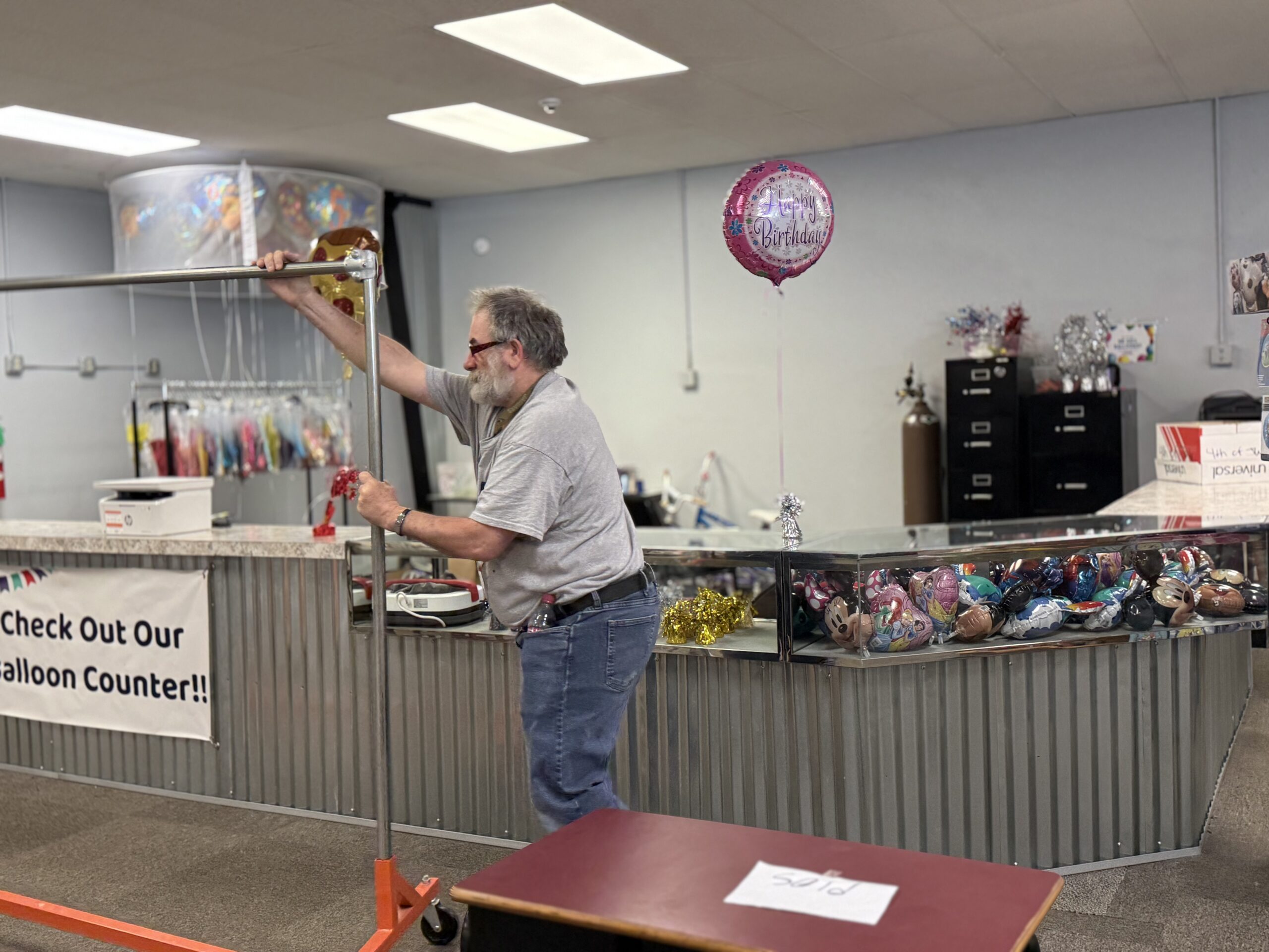 Individuals with developmental disabilities working at a charity thrift store.