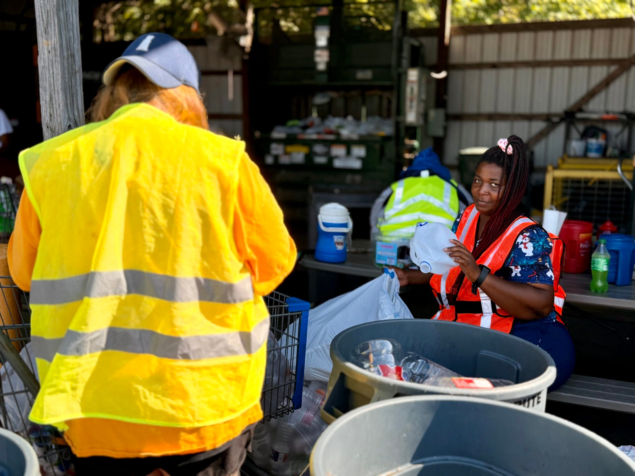 two women recycling